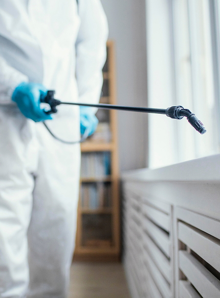 people disinfecting biohazard area